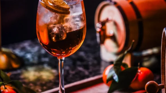 An Aperol spritz cocktail on a wooden tray at The Hercules Pillars, Holborn, available for £5 on Mondays