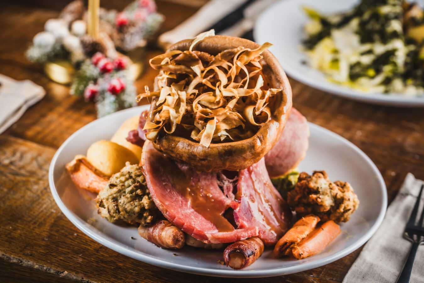 Traditional roast dinner with beef, vegetables, and Yorkshire pudding at Hercules Pillars.