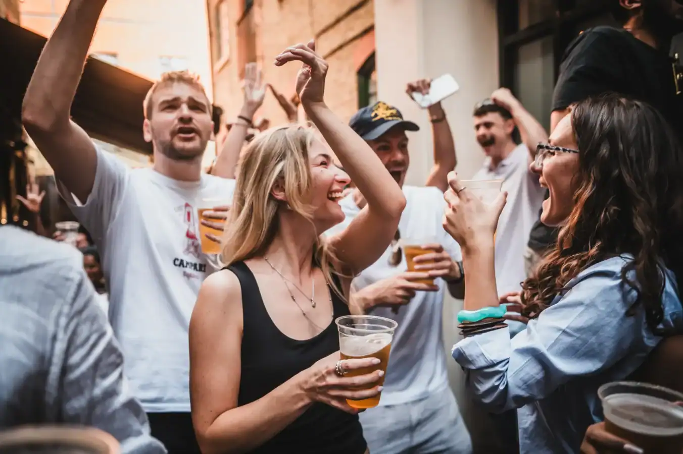 People enjoying drinks and socialising at The Hercules Pillars pub.